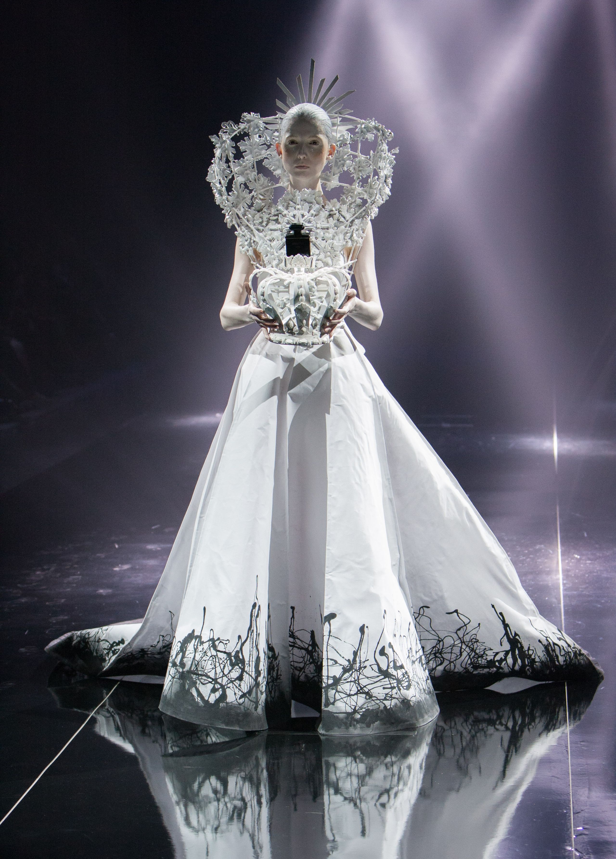 Haute couture gown on the runway, black and white
